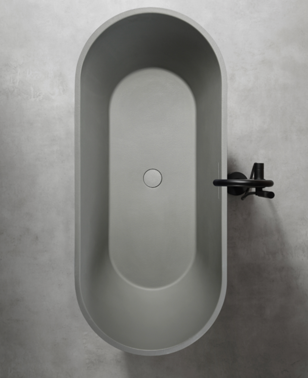 Dahua Oval Freestanding Bathtub – Stone Texture | Soft Curves, Timeless Serenity
